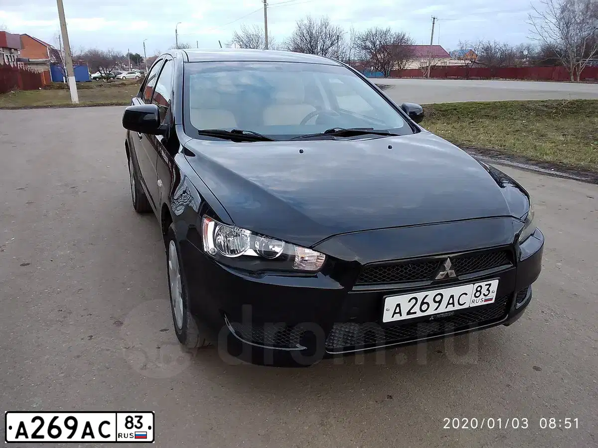 Фото автомобиля MITSUBISHI LANCER, 2010 — госномер Т288ВА180