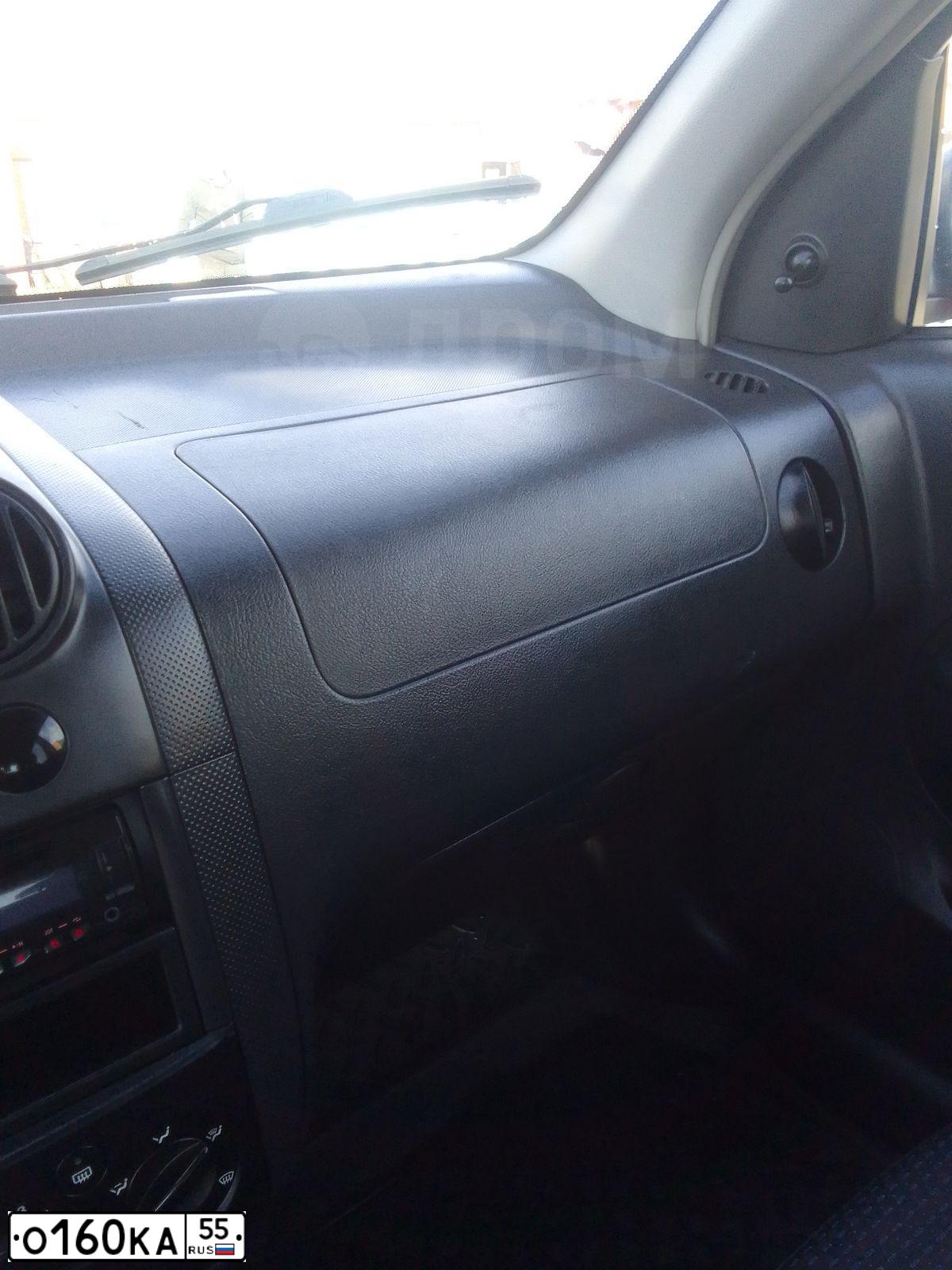 Фото автомобиля CHEVROLET AVEO, 2007 — госномер О160КА55. Цвет: Красный