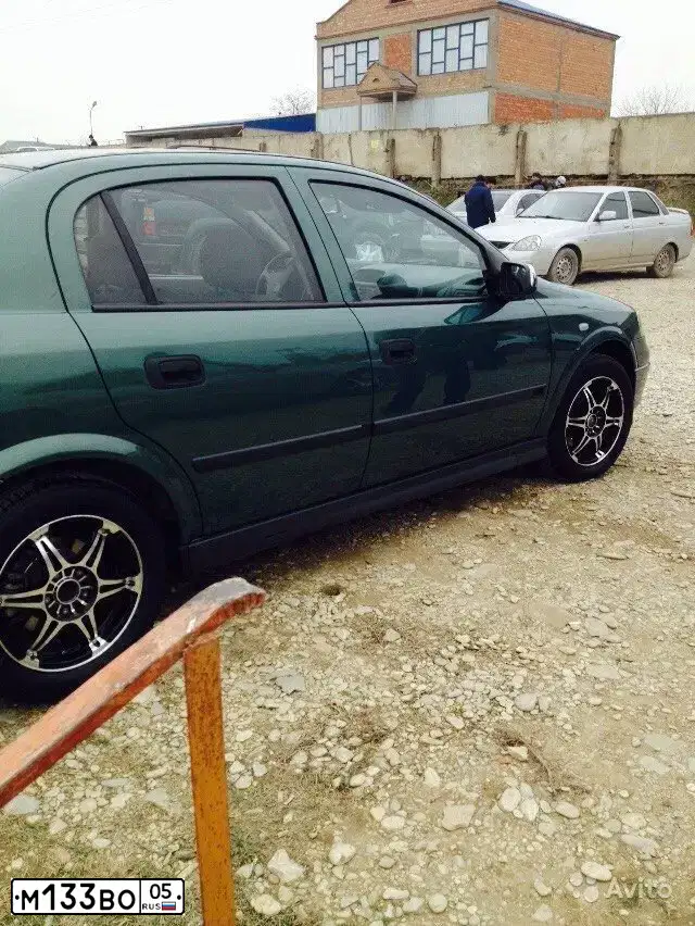 Фото автомобиля OPEL ASTRA, 2003 — госномер М133ВО05. Цвет: ЗЕЛЕНЫЙ