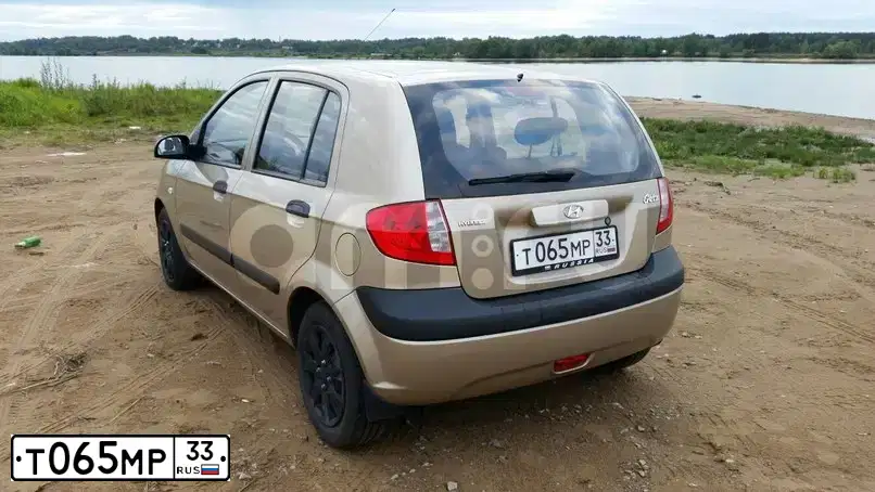 Фото автомобиля HYUNDAI GETZ, 2008 — госномер Т065МР33. Цвет: БЕЖЕВЫЙ