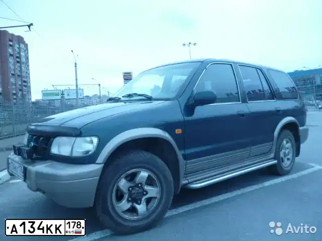 Фото автомобиля KIA SPORTAGE, 2002 — госномер А134КК178. Цвет: ЗЕЛЕНЫЙ