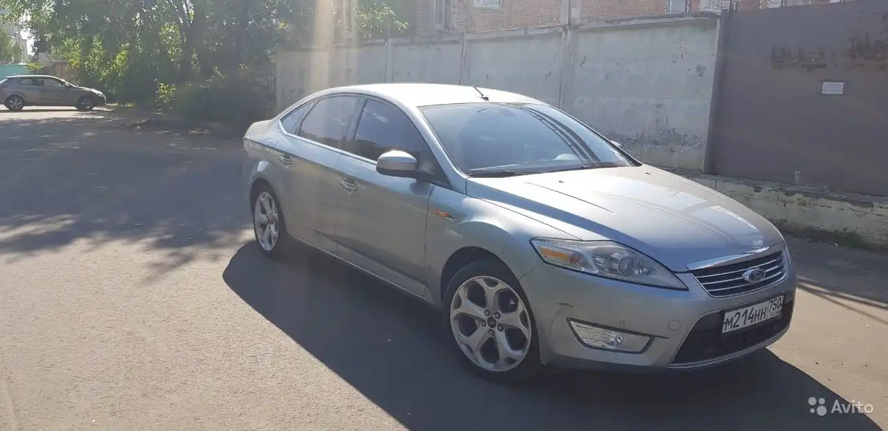 Фото автомобиля FORD MONDEO, 2007 — госномер А658КС180. Цвет: Серый