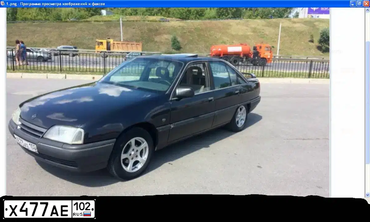Фото автомобиля AUDI 80, 1993 — госномер Х477АЕ102. Цвет: СЕРЫЙ