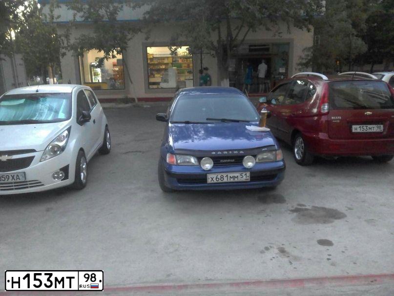 Фото автомобиля CHEVROLET REZZO, 2006 — госномер Н153МТ98. Цвет: ТЕМНО-КРАСНЫЙ
