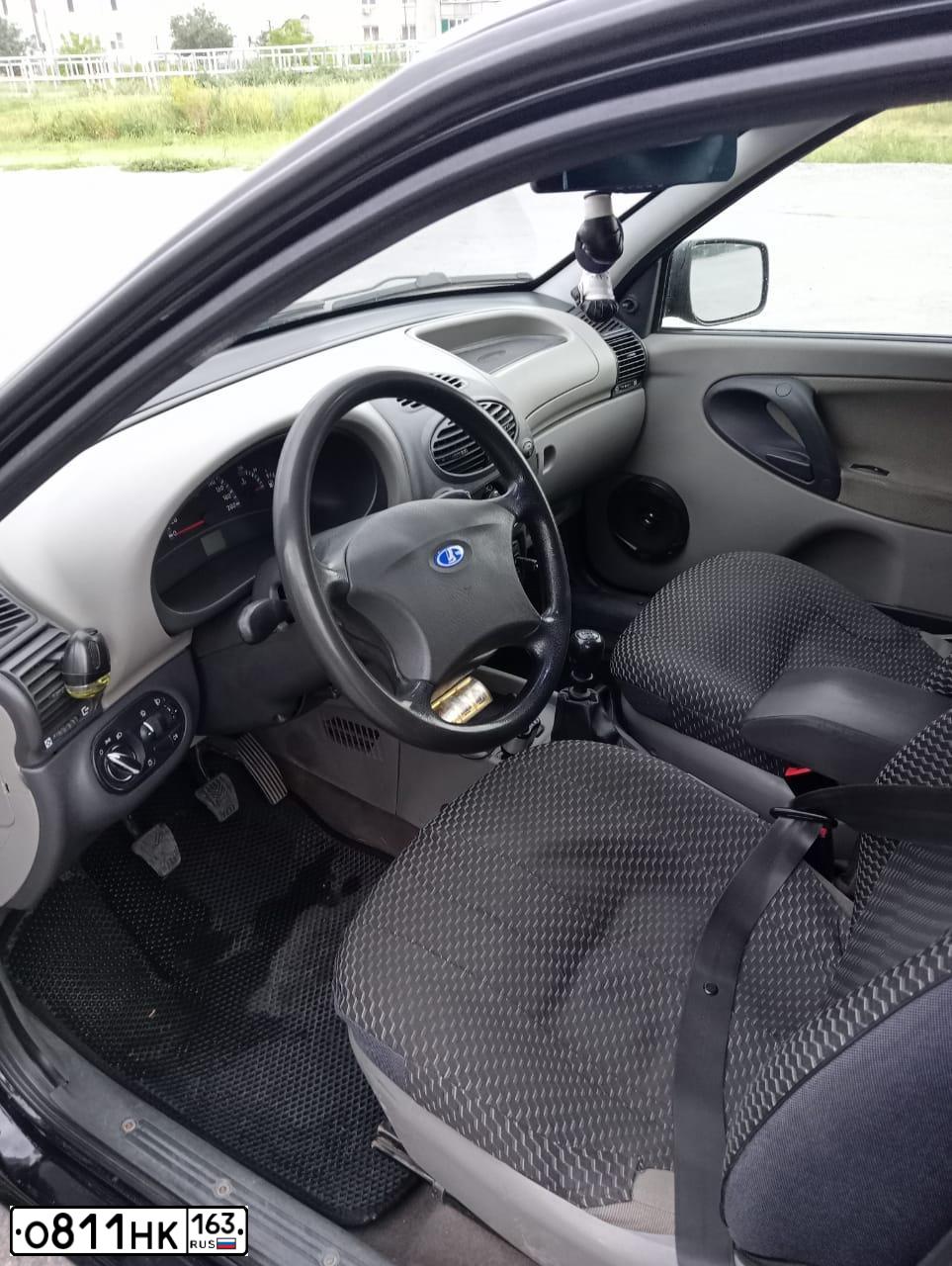 Фото автомобиля LADA 1117 KALINA, 2011 — госномер Р123КО73. Цвет: Сине-Черный