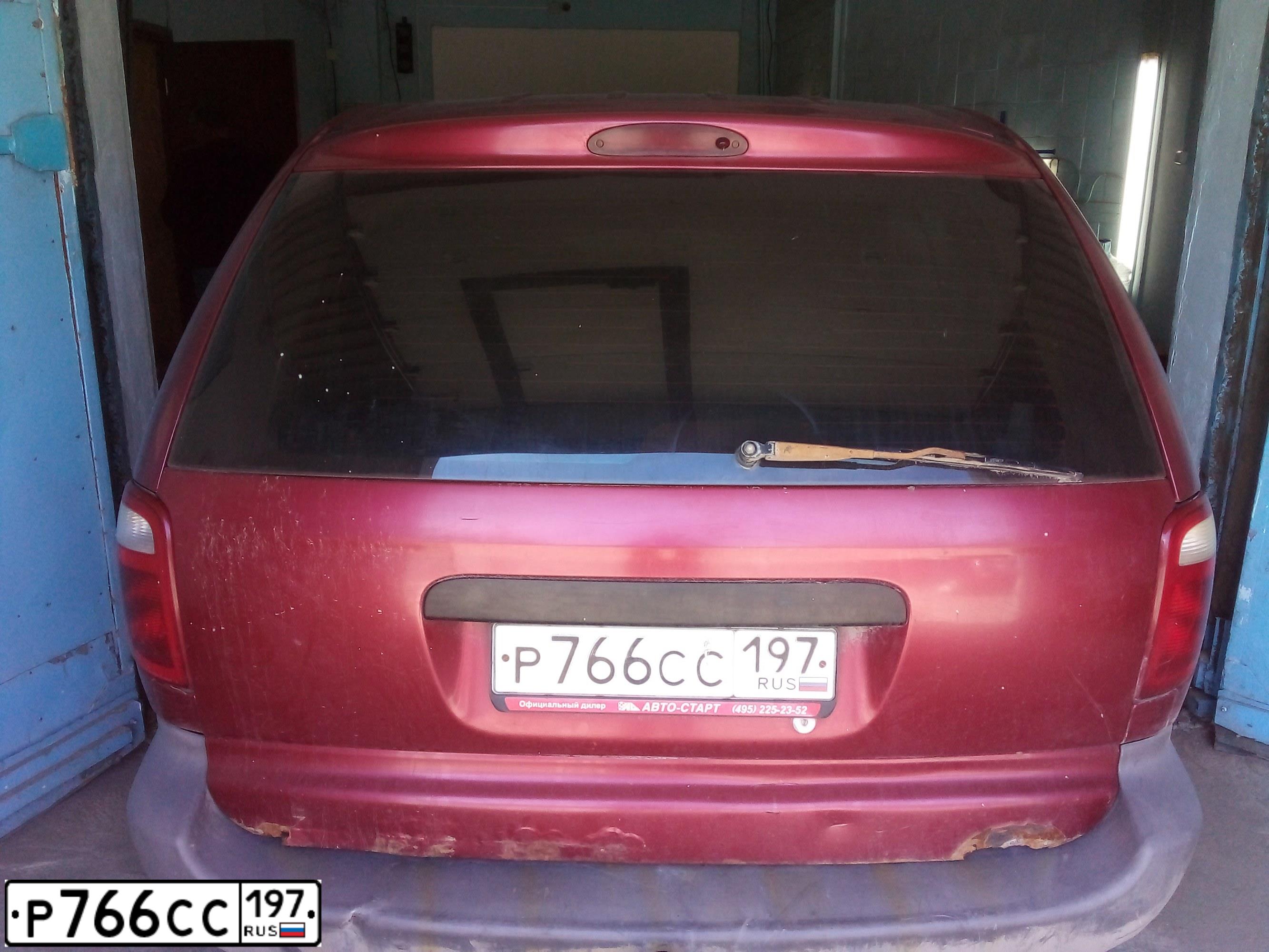 Фото автомобиля DODGE /GRAND/ CARAVAN, 2002 — госномер Р766СС197. Цвет: ВИШНЕВЫЙ