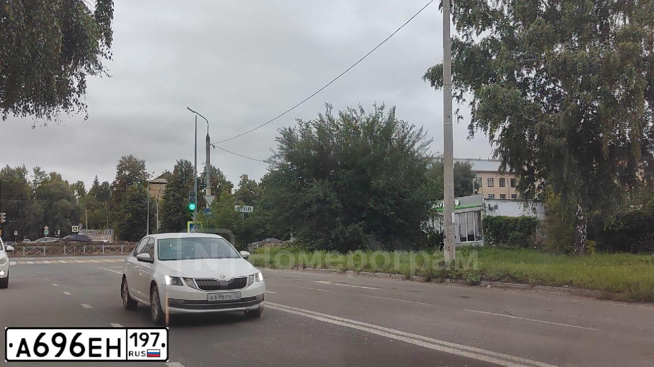 Фото автомобиля FORD FOCUS, 2010 — госномер К156ЕК134. Цвет: Белый