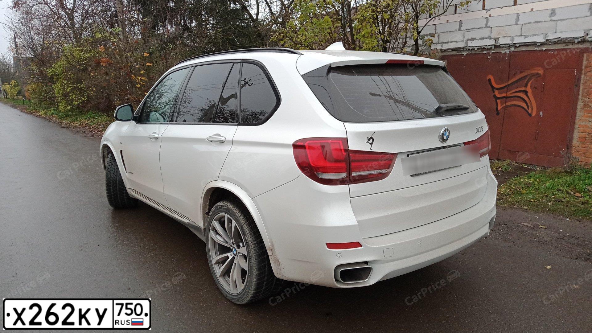 Фото автомобиля BMW X5, 2016 — госномер М900ВК50. Цвет: Белый