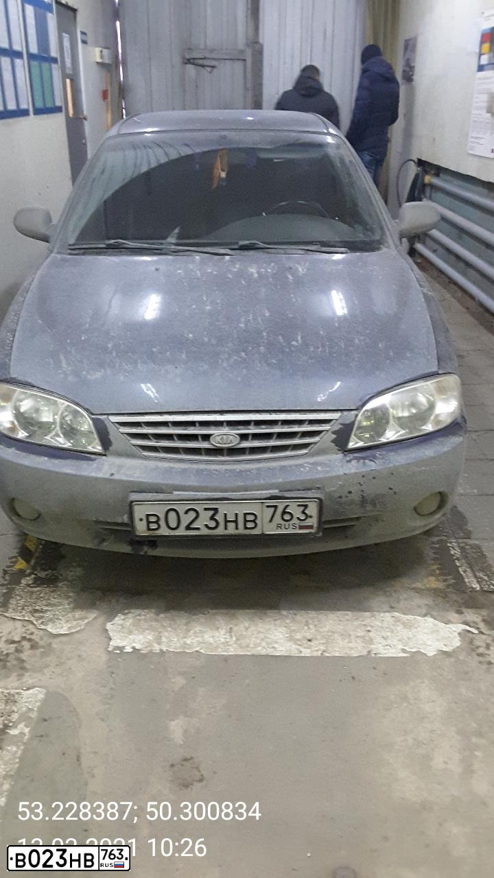 Фото автомобиля KIA SPECTRA, 2006 — госномер В023НВ763. Цвет: МЕРЦАЮЩИЙ СИНИЙ