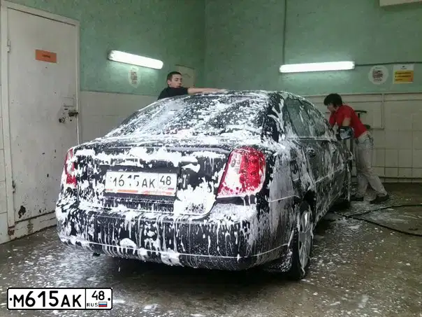 Фото автомобиля CHEVROLET LACETTI, 2012 — госномер М615АК48. Цвет: ЧЕРНЫЙ