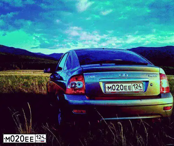 Фото автомобиля LADA 2172 PRIORA, 2009 — госномер М020ЕЕ124. Цвет: СЕРЫЙ