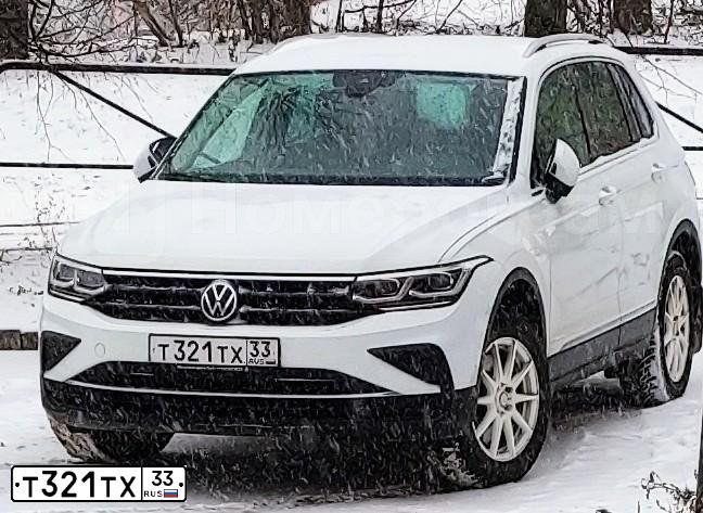 Фото автомобиля VOLKSWAGEN TIGUAN, 2021 — госномер У723ТХ33. Цвет: Белый