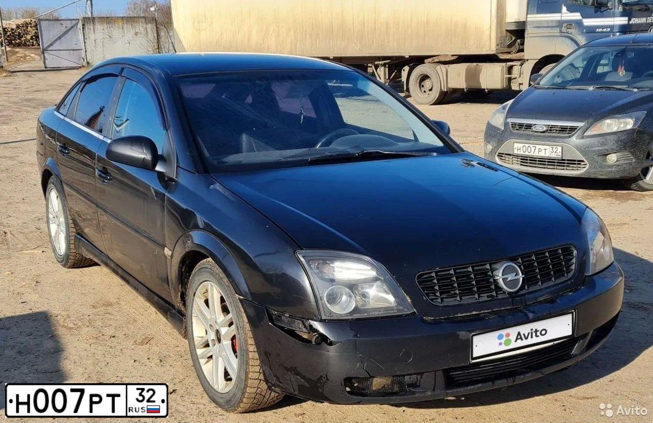 Фото автомобиля FORD D FOCUS, 2011 — госномер О544НА32. Цвет: ЧЕРНЫЙ