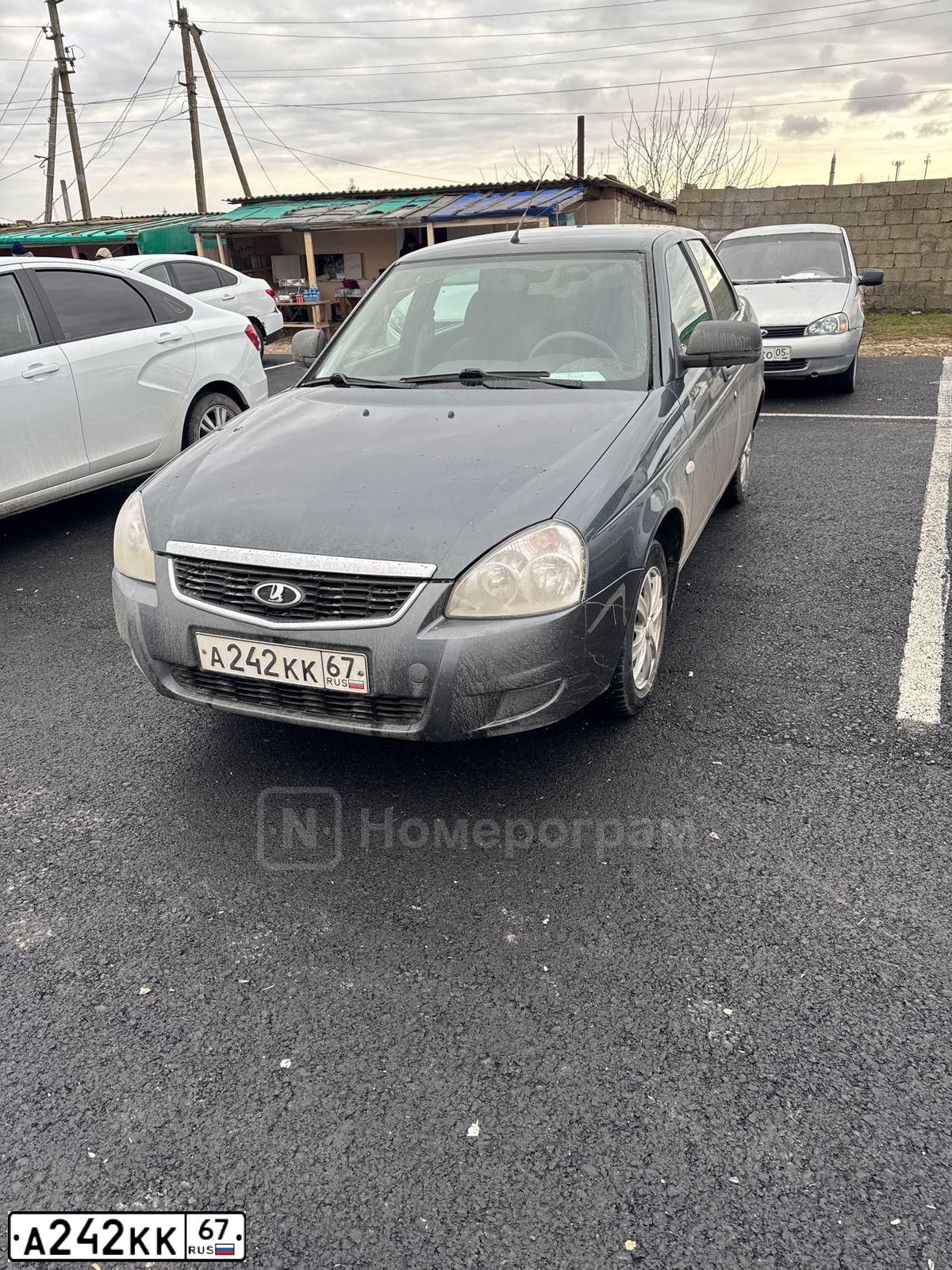Фото автомобиля LADA PRIORA, 2018 — госномер Е586ХЕ95. Цвет: серебристо темно серый
