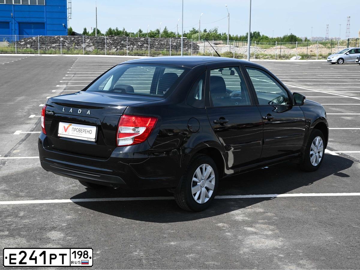 Фото автомобиля LADA 2190 GRANTA, 2019 — госномер Е241РТ198. Цвет: ЧЕРНЫЙ