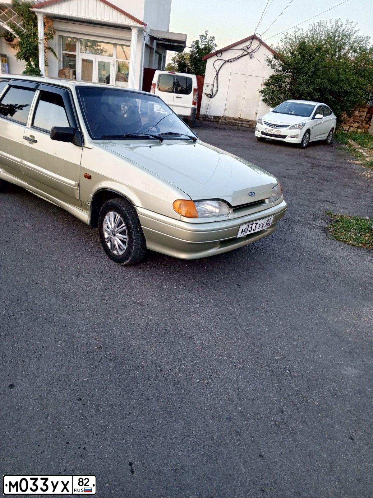 Фото автомобиля LADA 2114 SAMARA, 2006 — госномер М033УХ82. Цвет: БЕЛО-ЗЕЛЕНЫЙ