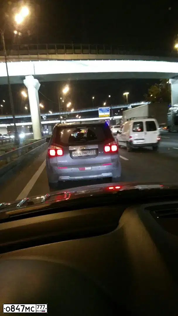 Фото автомобиля CHEVROLET ORLANDO, 2014 — госномер М799ТК799. Цвет: Серый