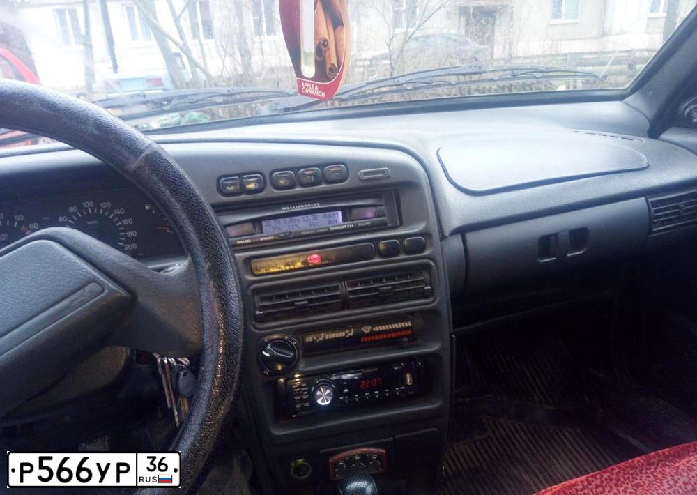 Фото автомобиля LADA 2115 SAMARA, 2003 — госномер Р566УР36. Цвет: Темно-зеленый