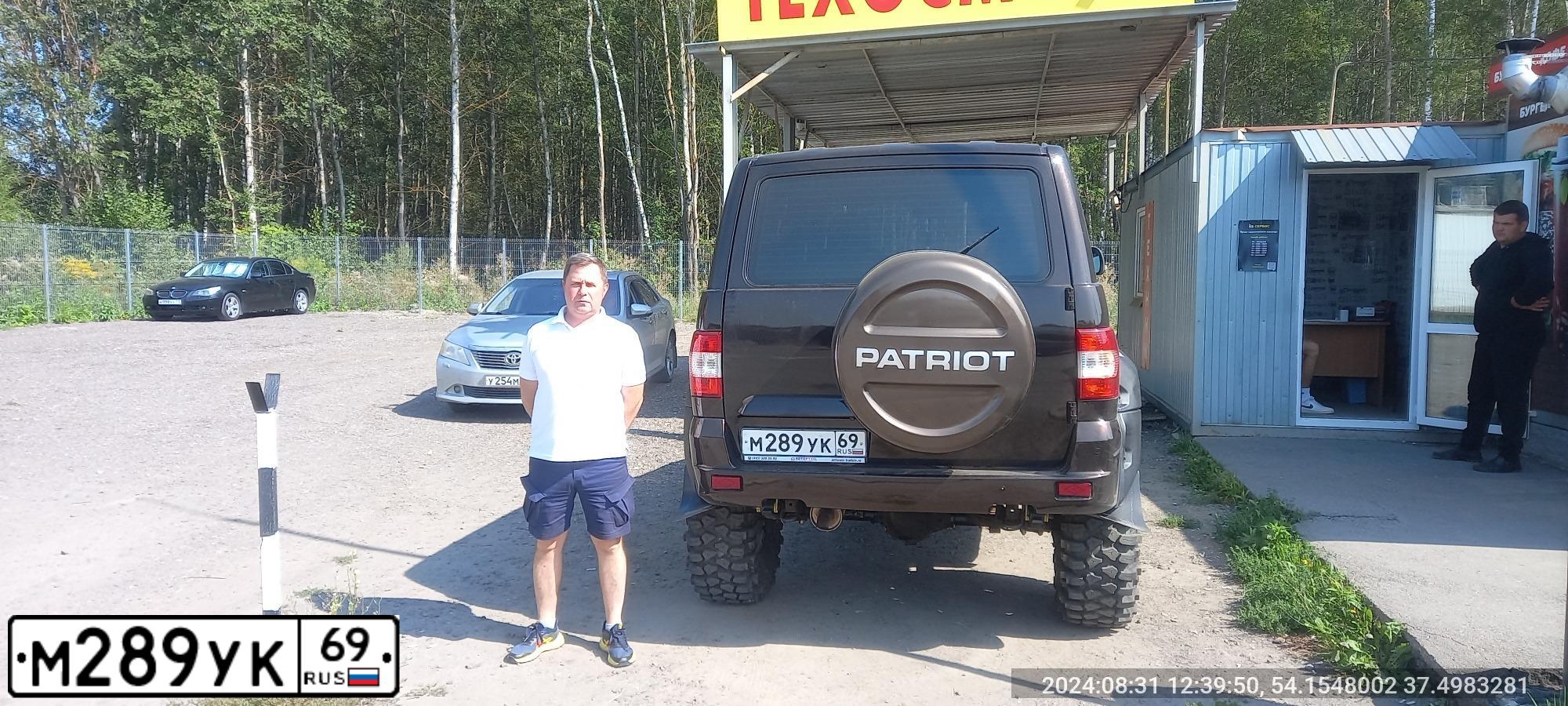 Фото автомобиля UAZ 3163 PATRIOT, 2018 — госномер М289УК69. Цвет: КОРИЧНЕВЫЙ МЕТАЛЛИК