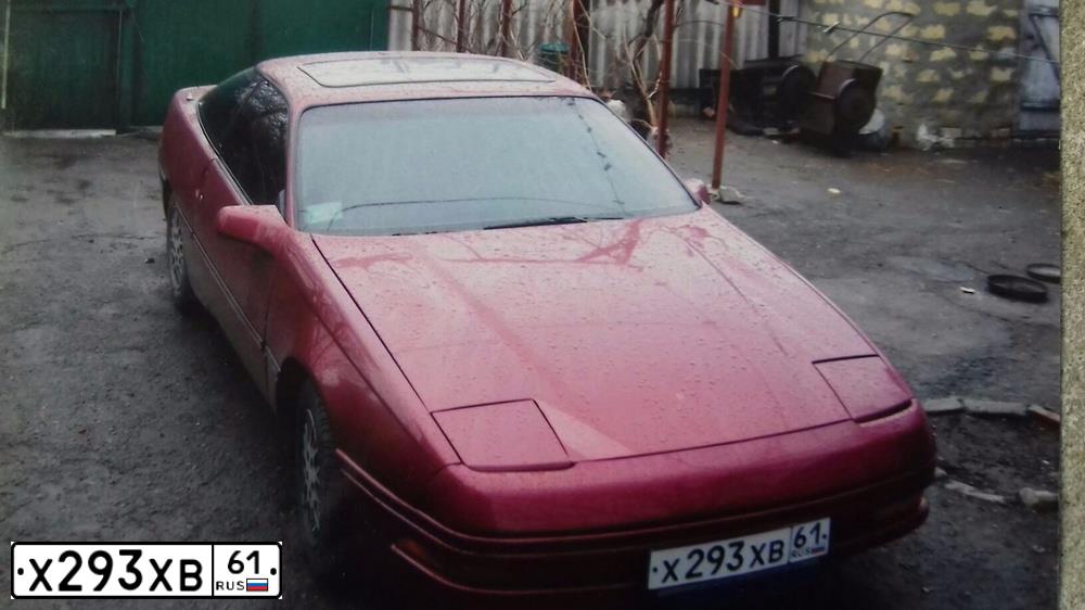 Фото автомобиля FORD PROBE, 1989 — госномер Х293ХВ61. Цвет: ВИШНЕВЫЙ