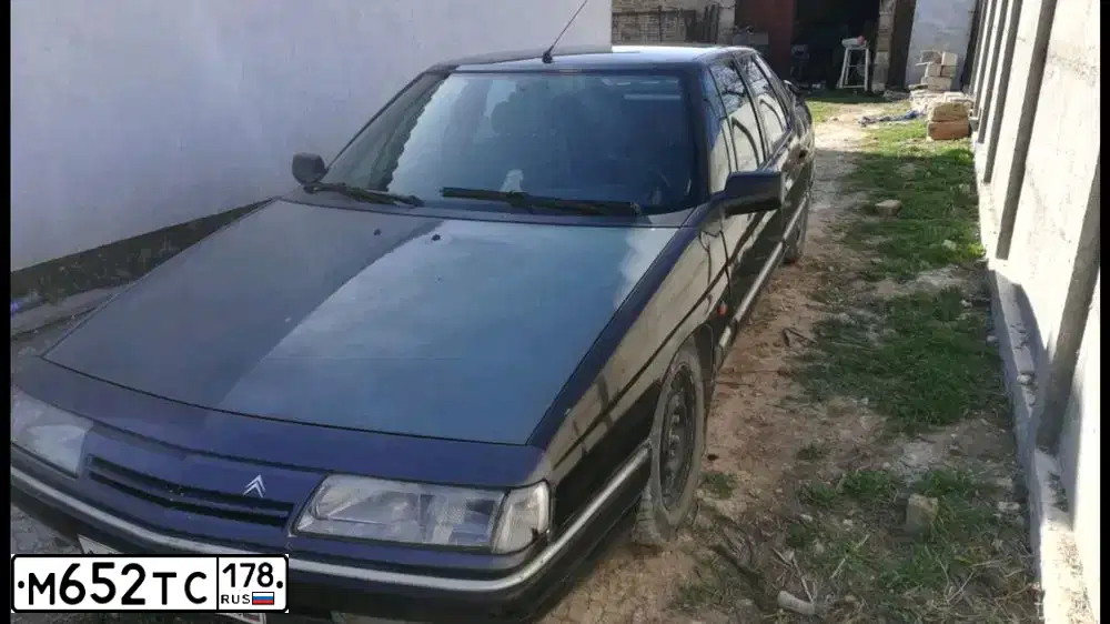 Фото автомобиля CITROEN XM, 1993 — госномер М652ТС178. Цвет: темно-серый