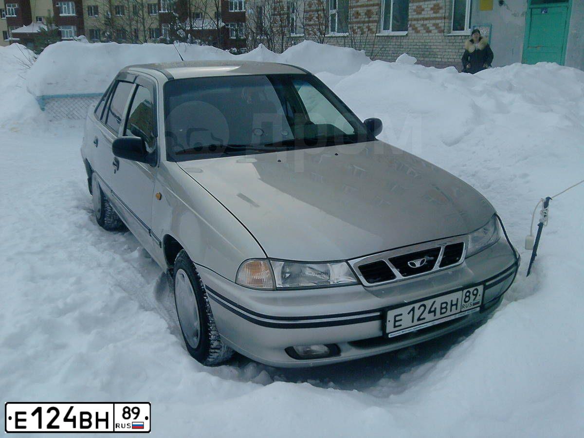 Фото автомобиля DAEWOO NEXIA, 2007 — госномер Е124ВН89. Цвет: ПЕРЛАМУТРОВО-СЕРЕБРИСТЫЙ