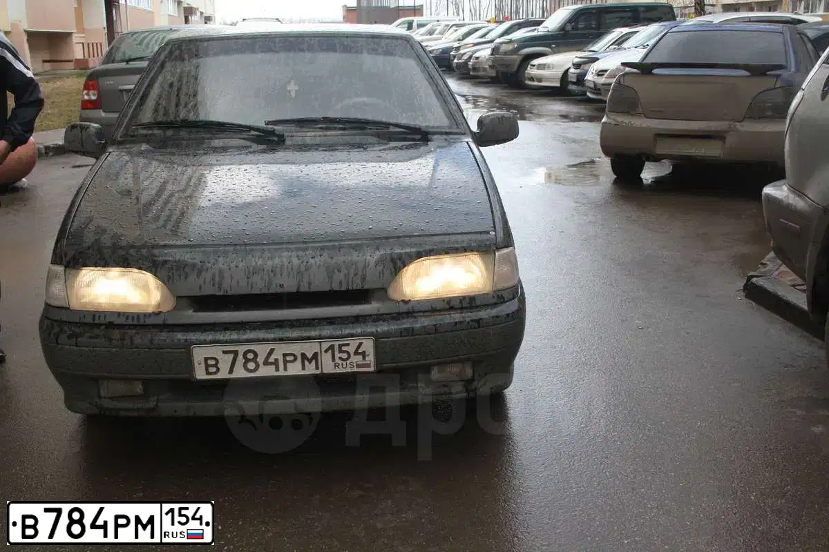 Фото автомобиля LADA 2114 SAMARA, 2008 — госномер В784РМ154. Цвет: ТЕМНО ЗЕЛЕНЫЙ
