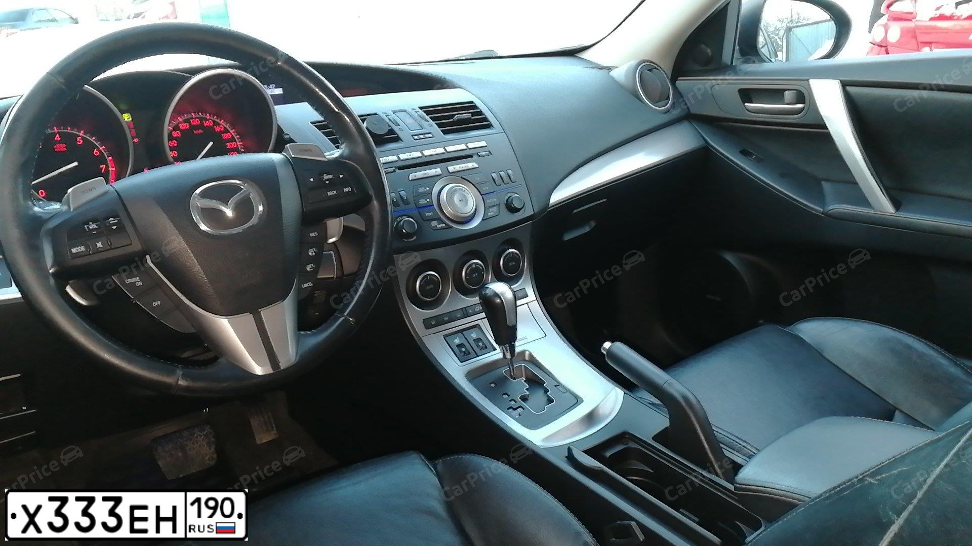 Фото автомобиля MAZDA 3, 2009 — госномер Х333ЕН190. Цвет: ЧЕРНЫЙ