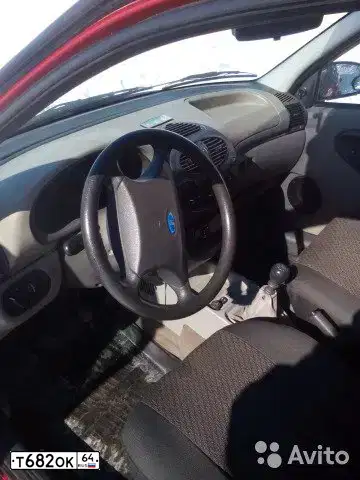 Фото автомобиля LADA 1118 KALINA, 2006 — госномер Т682ОК64. Цвет: Красный