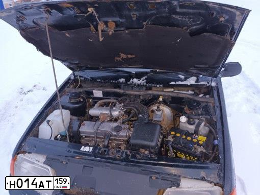 Фото автомобиля LADA 2115 SAMARA, 2007 — госномер Н014АТ159. Цвет: Черный графитовый металлик