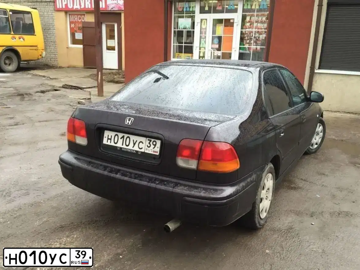 Фото автомобиля HONDA CIVIC, 1998 — госномер Н010УС39. Цвет: ФИОЛЕТОВЫЙ