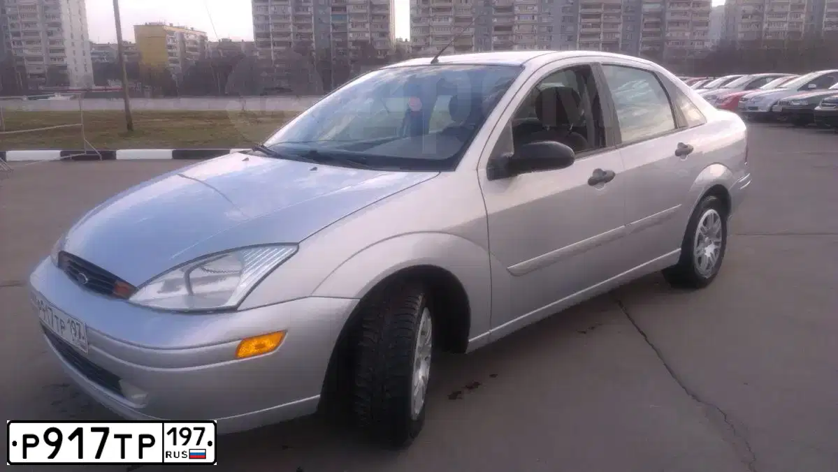 Фото автомобиля FORD FOCUS ZTS, 2001 — госномер Р967ВМ154. Цвет: Серебристый