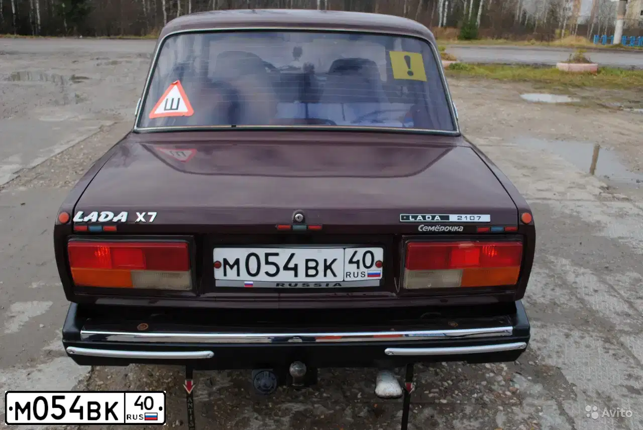 Фото автомобиля LADA 2107, 2005 — госномер М054ВК40. Цвет: ТЕМНО-ВИШНЕВЫЙ
