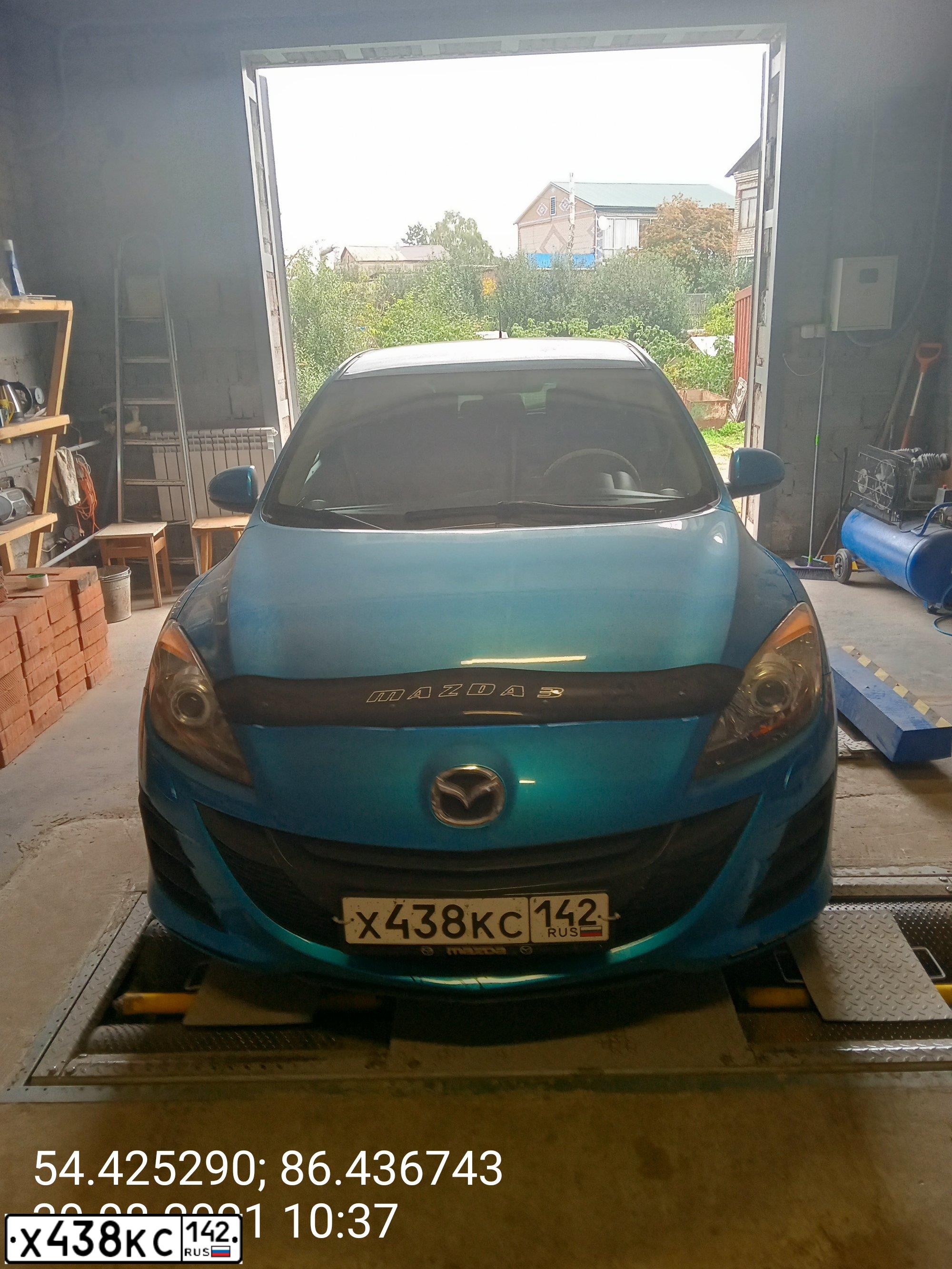 Фото автомобиля MAZDA 3, 2009 — госномер Х438КС142. Цвет: голубой