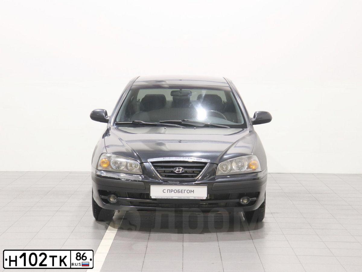 Фото автомобиля TAGAZ ELANTRA XD, 2009 — госномер Н102ТК86. Цвет: ЧЕРНЫЙ