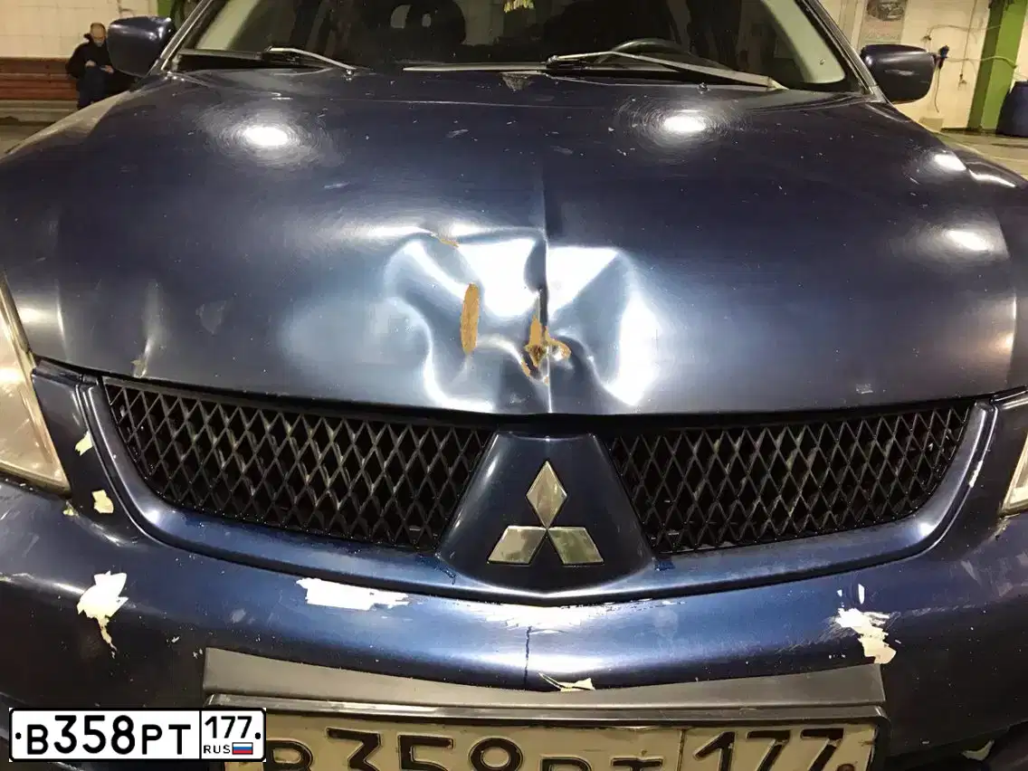 Фото автомобиля MITSUBISHI LANCER, 2006 — госномер К521УО134. Цвет: синий