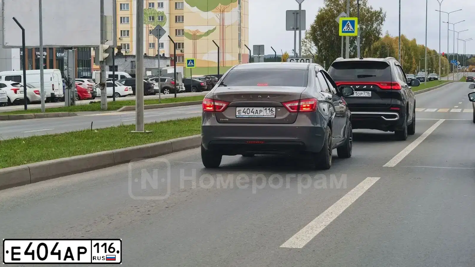 Фото автомобиля LADA VESTA, 2017 — госномер Е404АР116. Цвет: СЕРО-ГОЛУБОЙ