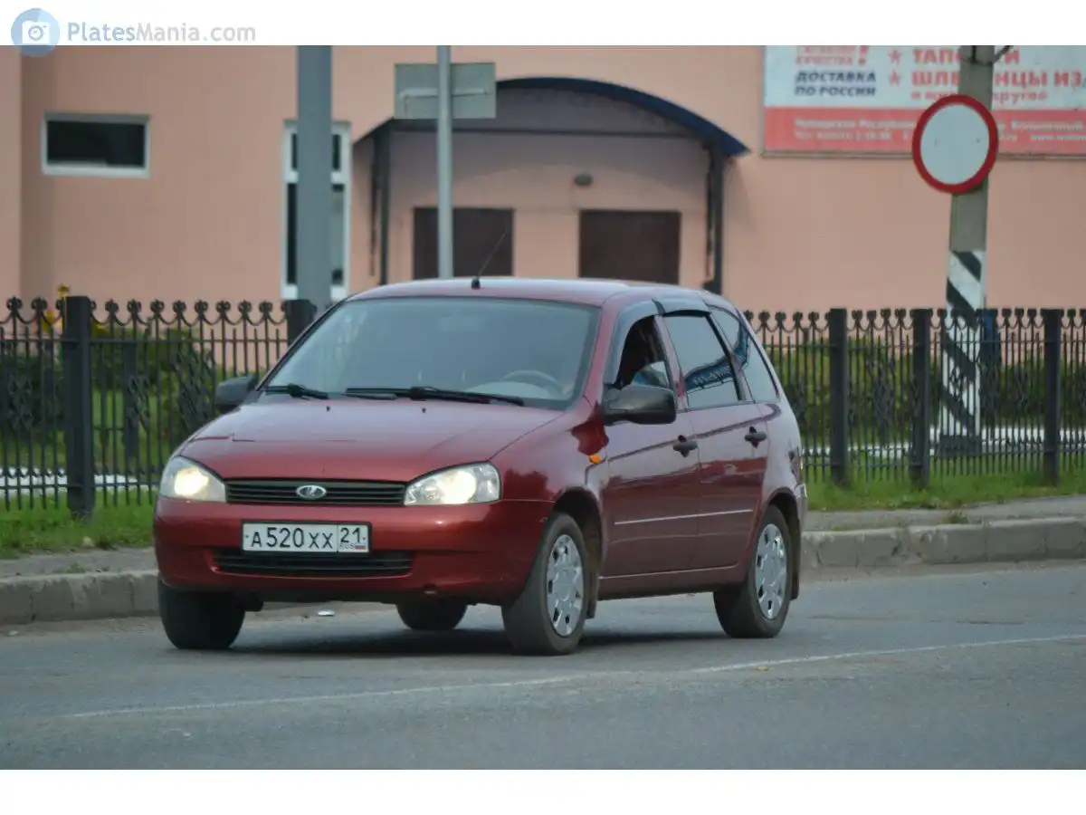 Фото автомобиля LADA 1117 KALINA, 2011 — госномер А520ХХ21. Цвет: КРАСНЫЙ