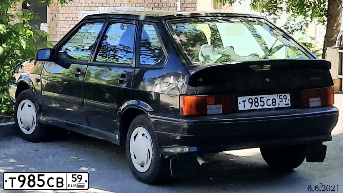 Фото автомобиля LADA 2114 SAMARA, 2010 — госномер Т985СВ59. Цвет: СИНЕ-ЧЕРНЫЙ