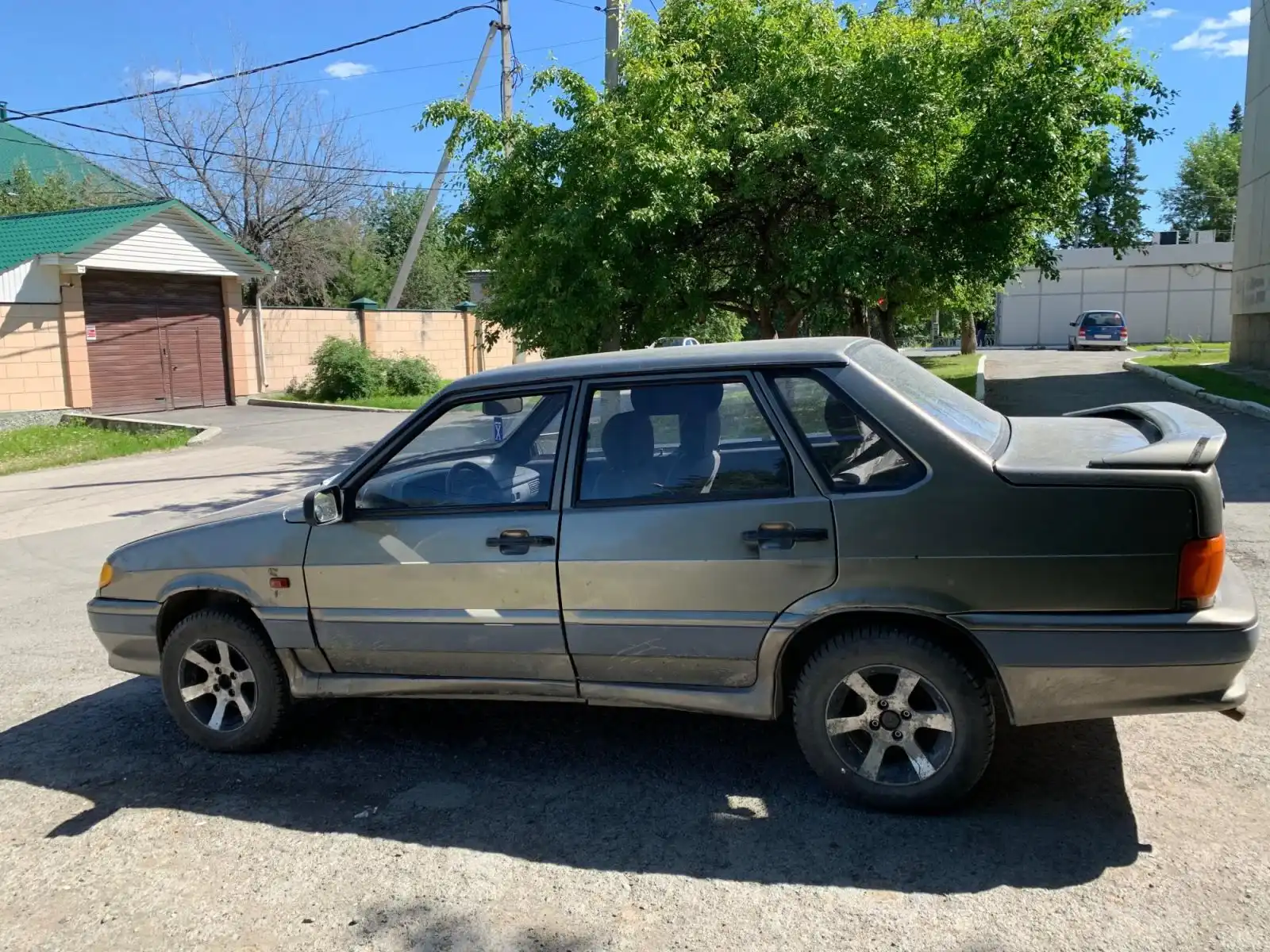 Фото автомобиля LADA 2115 SAMARA, 2001 — госномер Т245НТ196. Цвет: СЕРО-ЗЕЛЕНЫЙ