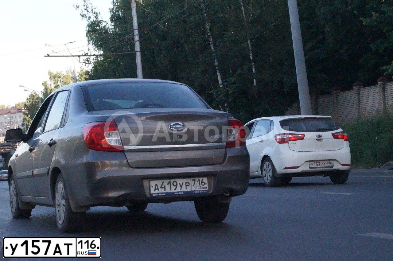 Фото автомобиля KIA RIO, 2013 — госномер У157АТ116. Цвет: Белый