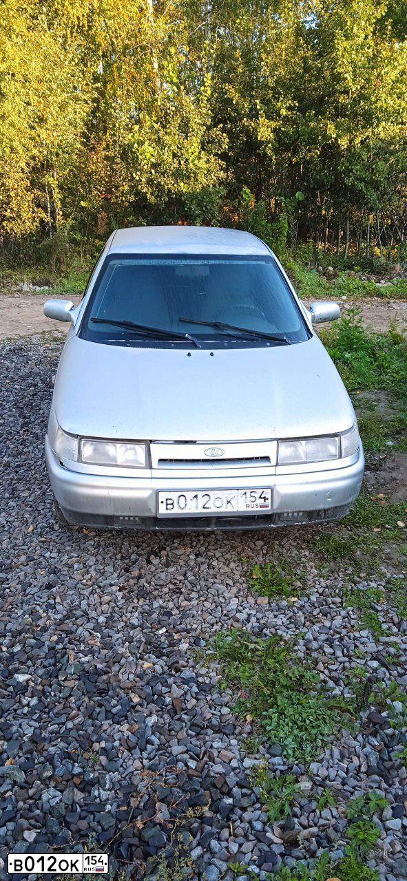 Фото автомобиля LADA 2112, 2006 — госномер Е129ЕУ122. Цвет: СВЕТЛО СЕРЕБРИСТЫЙ МЕТАЛЛ