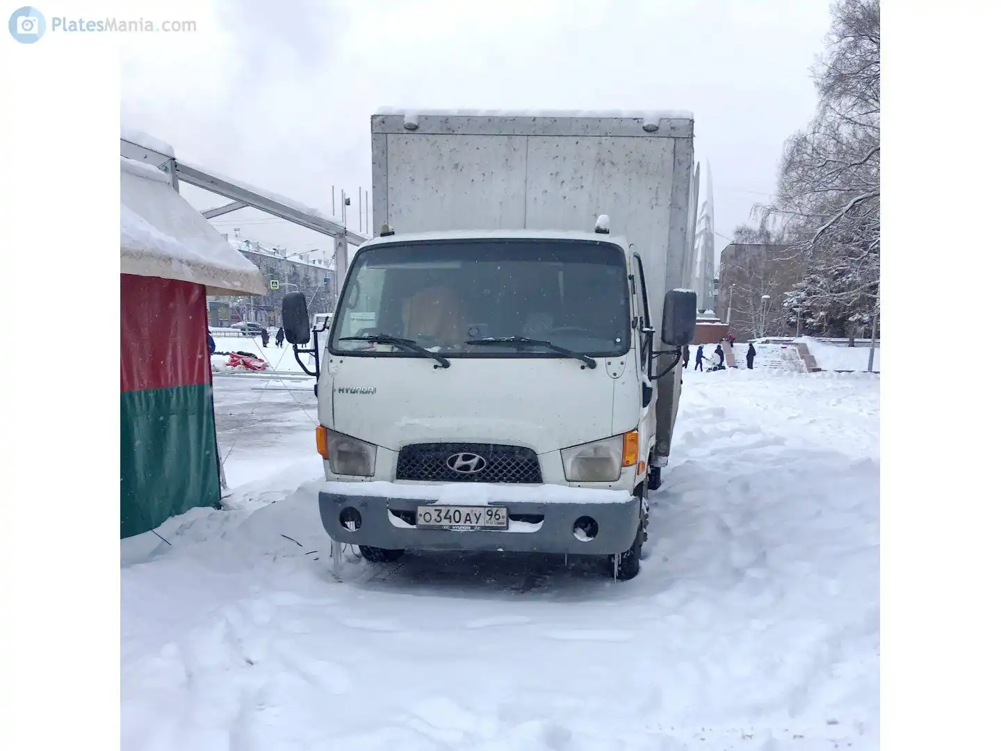 Фото автомобиля HYUNDAI MIGHTY, 2009 — госномер Е413ВА774. Цвет: Белый