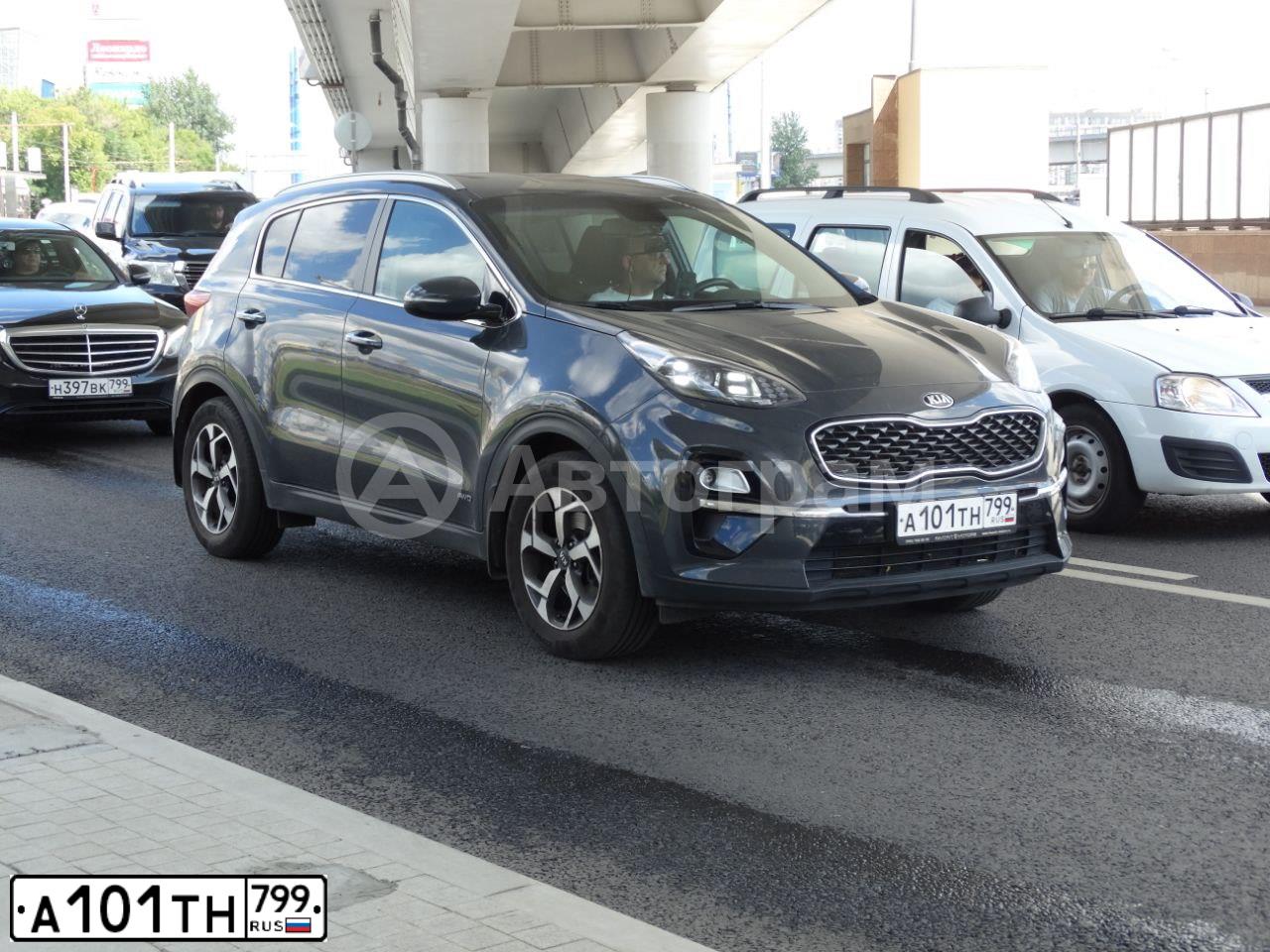 Фото автомобиля KIA SPORTAGE, 2019 — госномер А101ТН799. Цвет: Серый