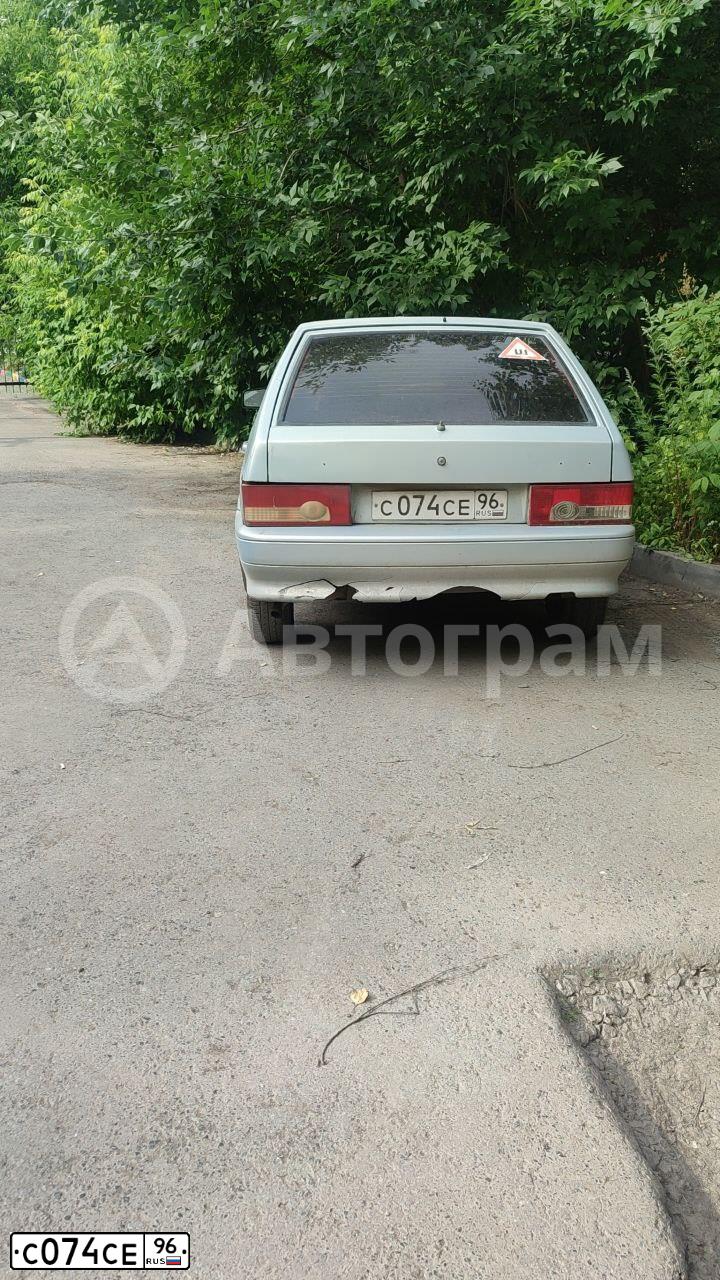 Фото автомобиля LADA 21144, 2007 — госномер С074СЕ96. Цвет: желто-голубой