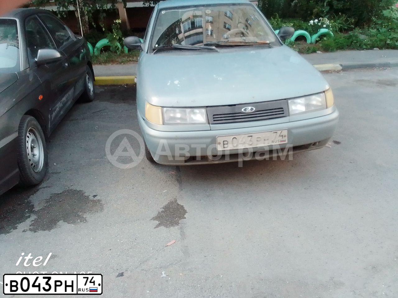 Фото автомобиля LADA 2112, 2003 — госномер В043РН74. Цвет: СЕРО-ЗОЛОТИСТЫЙ