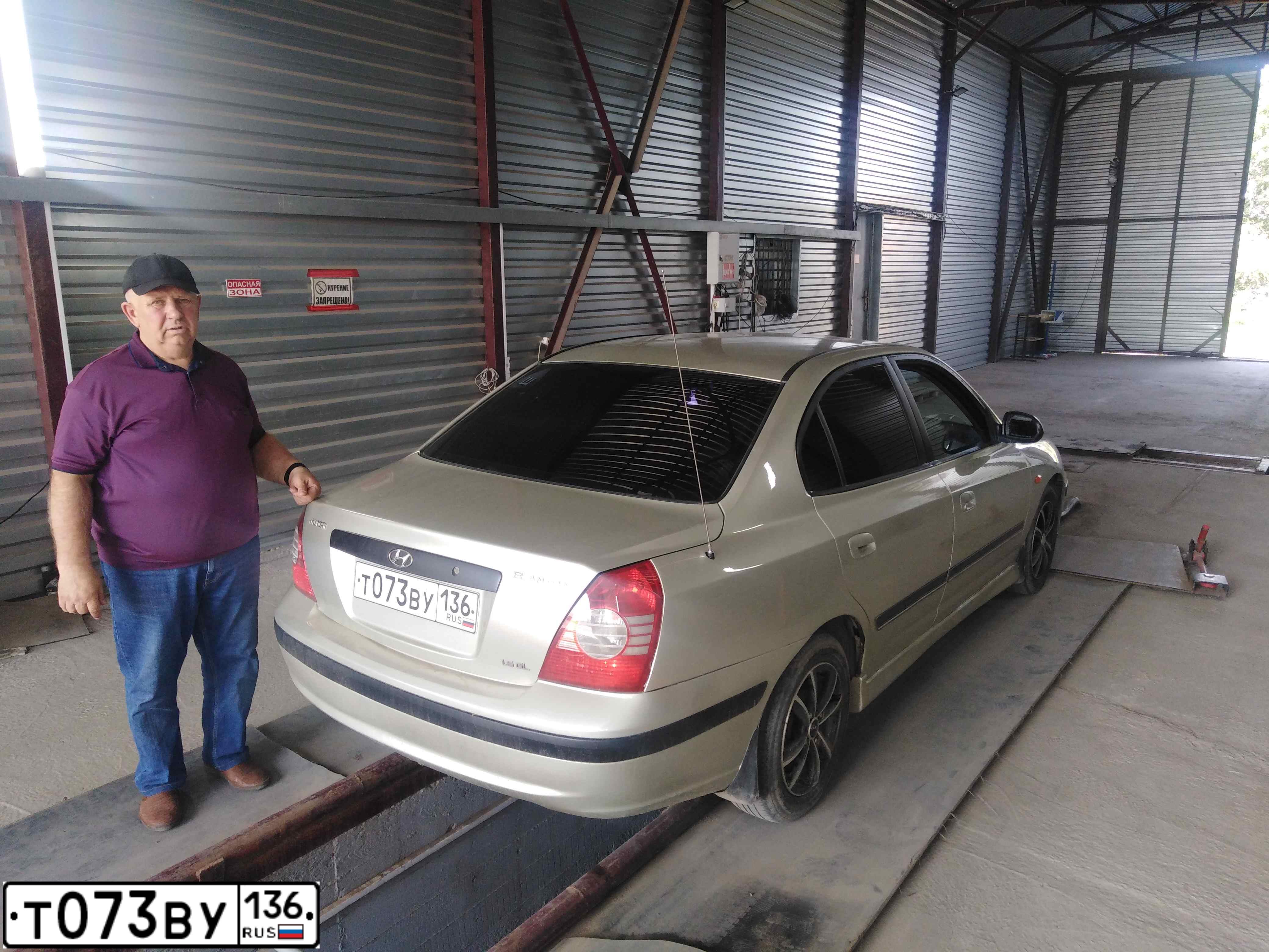 Фото автомобиля HYUNDAI ELANTRA, 2004 — госномер Т073ВУ136. Цвет: ЖЕЛТО-ПЕСОЧНЫЙ