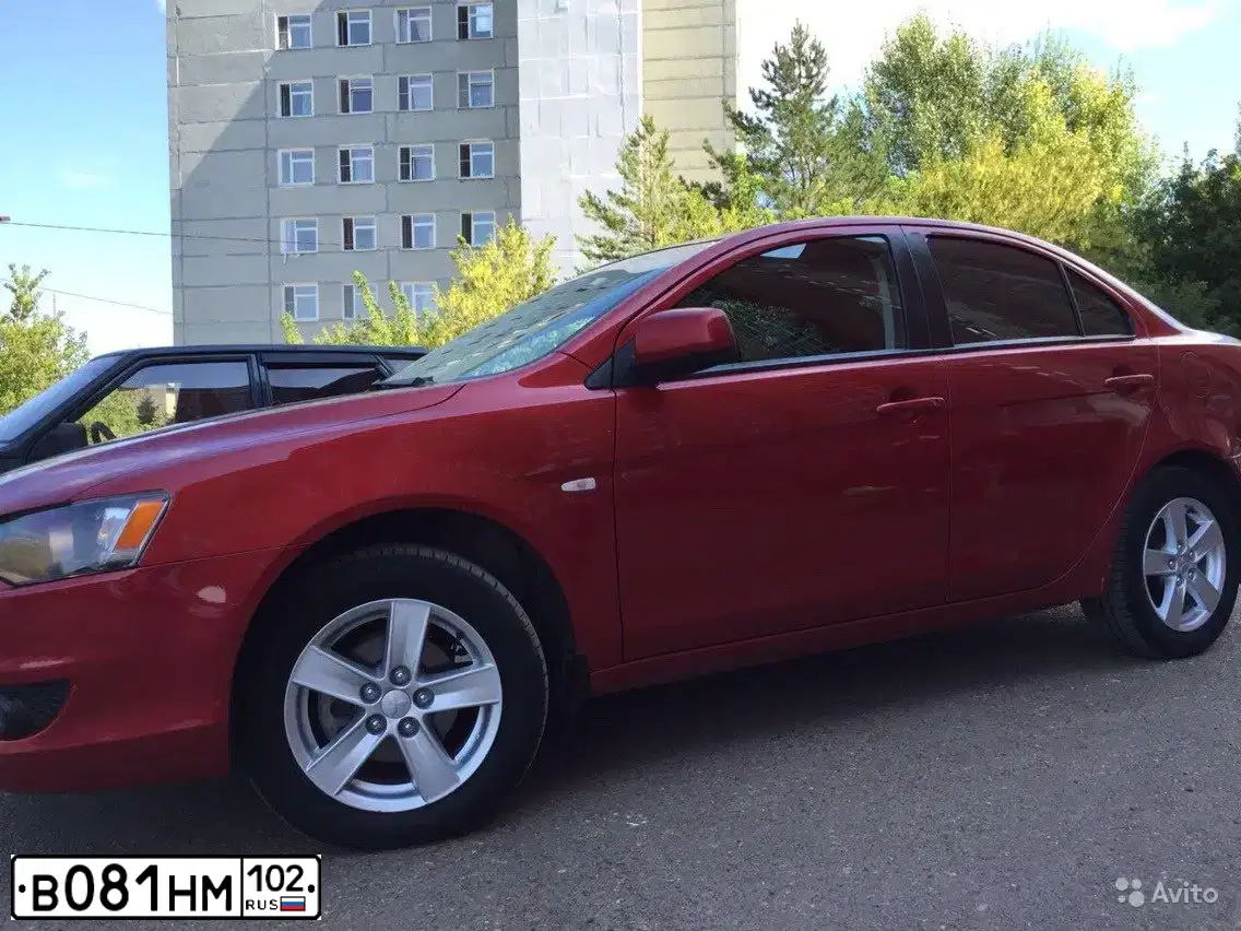 Фото автомобиля MITSUBISHI LANCER, 2008 — госномер В444ЕМ102. Цвет: Красный