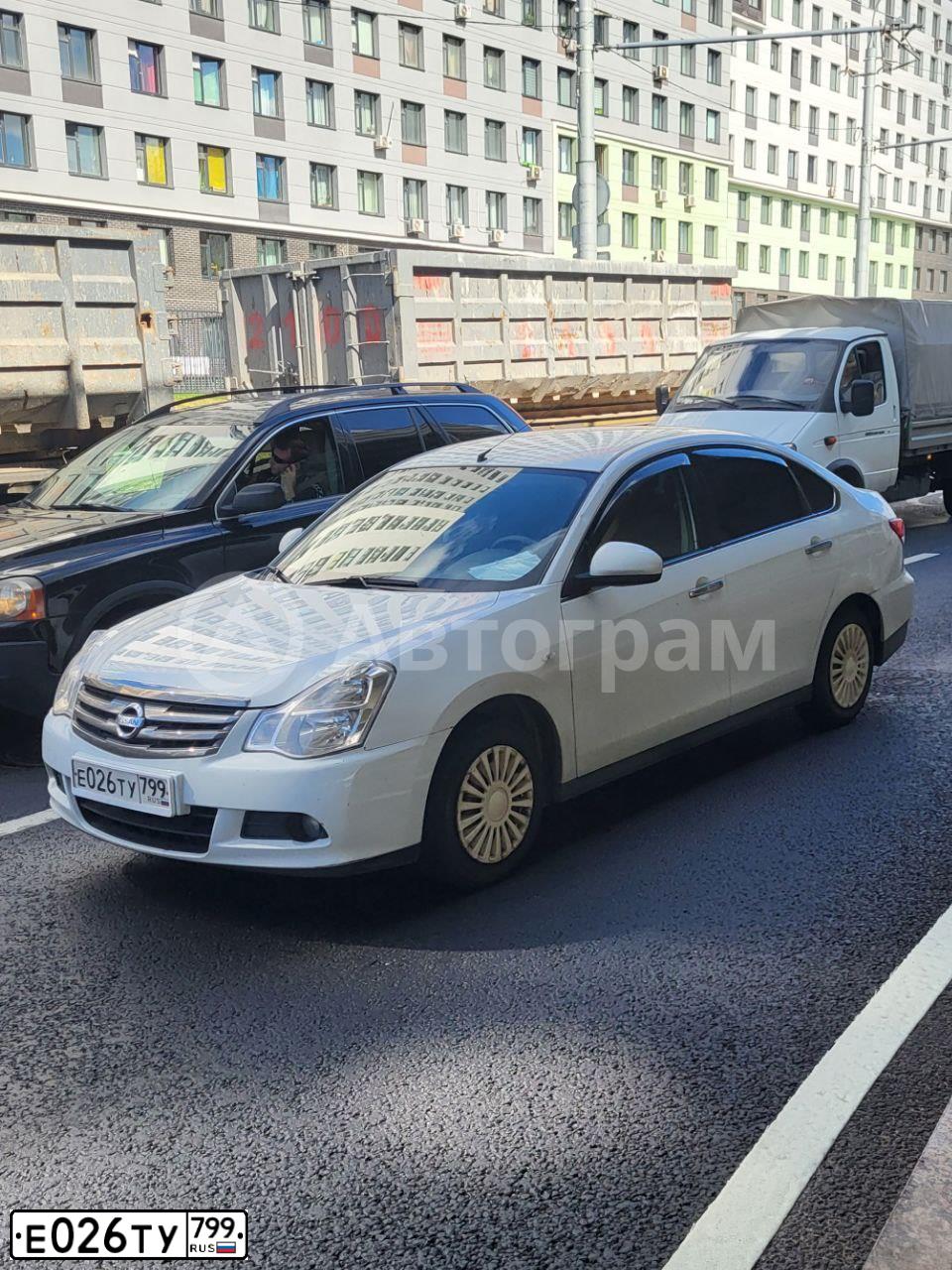 Фото автомобиля NISSAN ALMERA /AVTOVAZ/, 2017 — госномер Е026ТУ799. Цвет: БЕЛЫЙ
