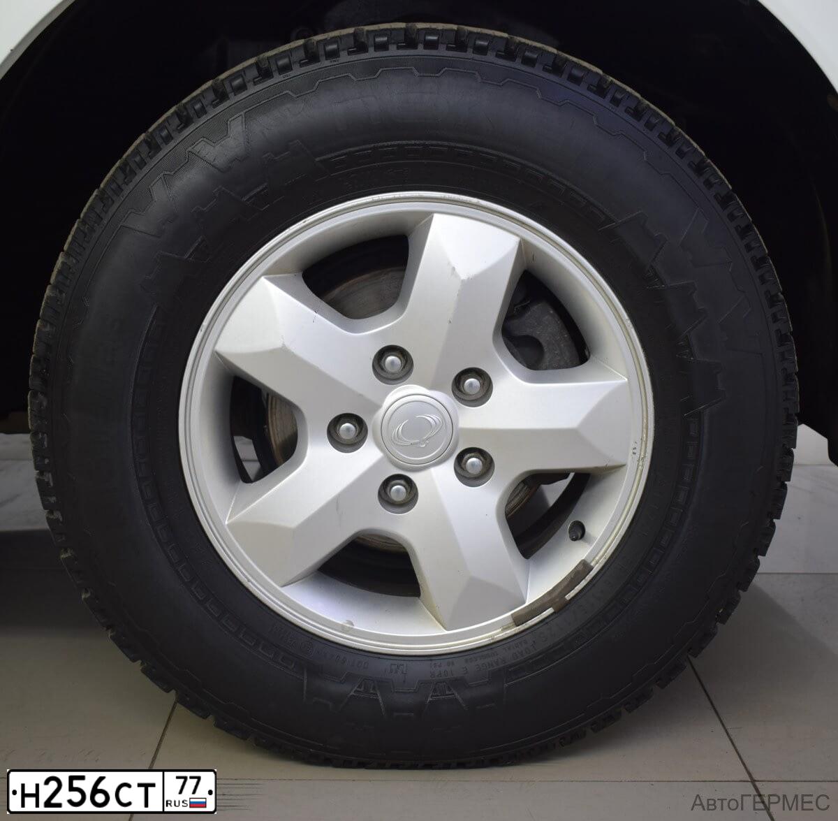 Фото автомобиля SSANGYONG KYRON, 2012 — госномер С355ВС797. Цвет: Белый